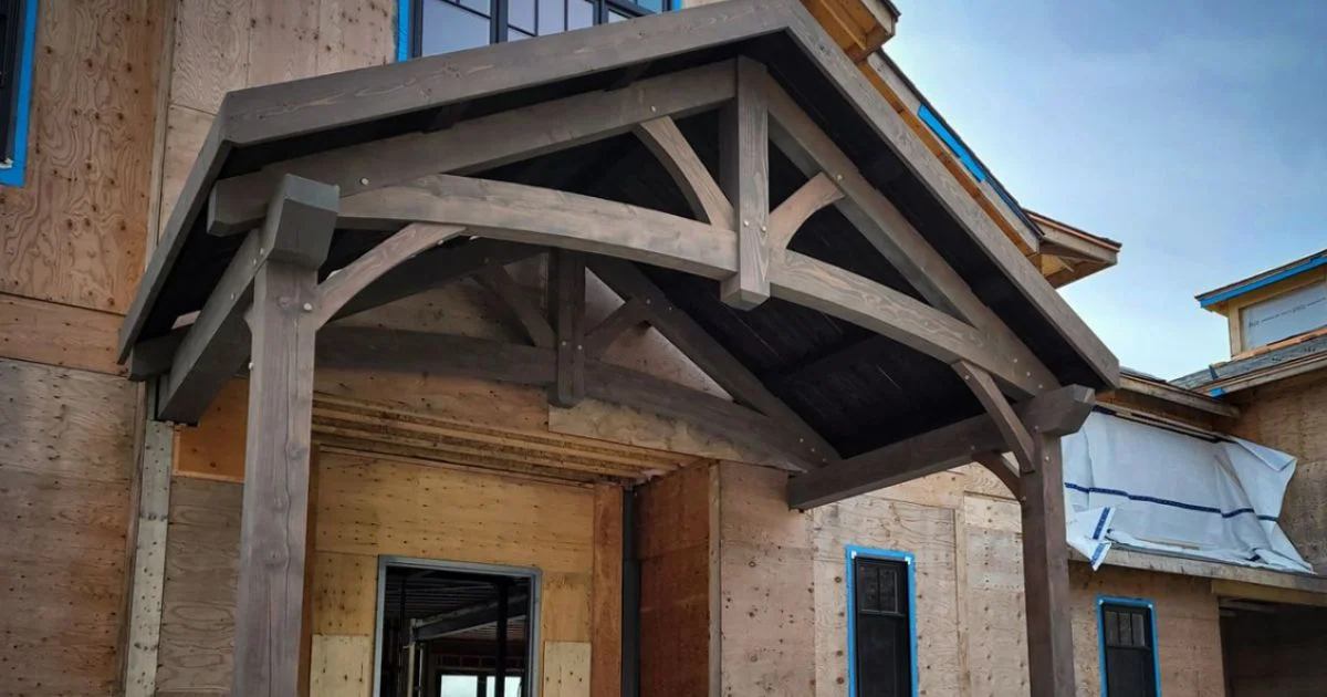Timber framed entry under construction
